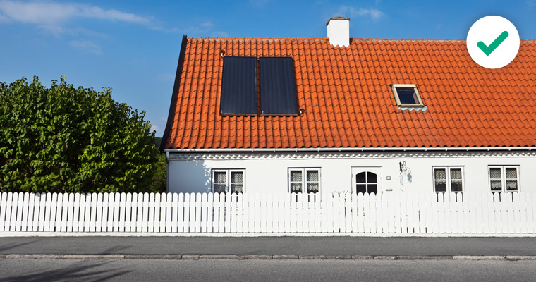 A low fence in front of a house