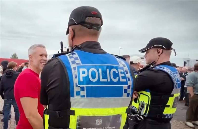 Stock photo of officer with fan