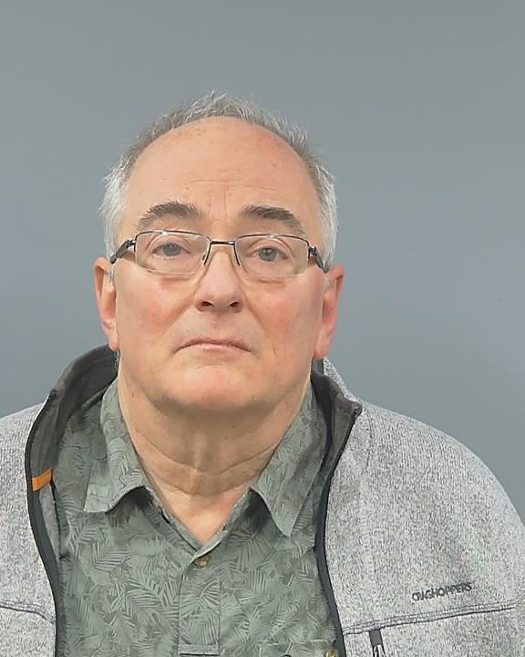 A custody image of Gerard Hutchings