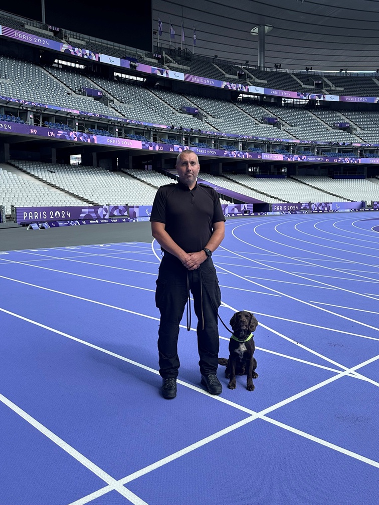 PC Paul Shutler (pictured with Explosive Detection Dog in Paris)